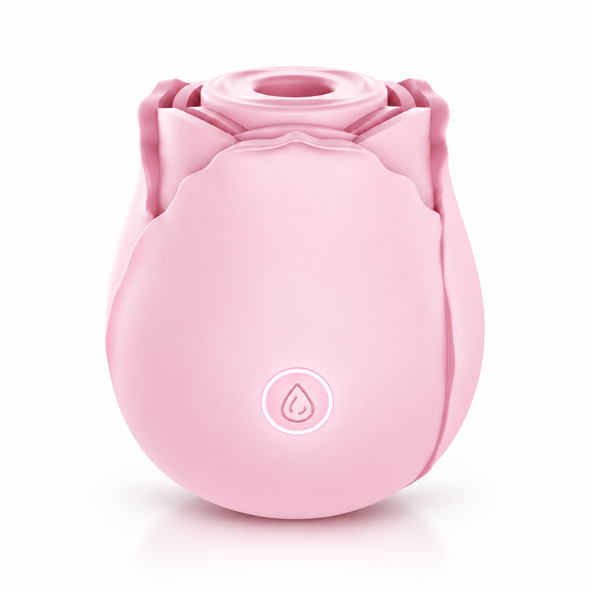 Pink rose-shaped silicone facial cleanser device on a white background